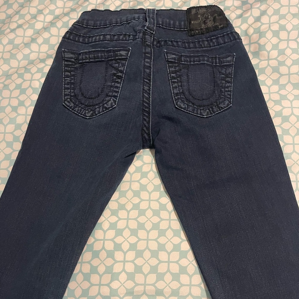 True Religion. Dark blue. Super skinny. Size 25. Rise 7. Inseam 27.